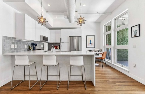 River North Art District Condo | Dog-Friendly 2BR Boho Loft in RiNo | Walk to Mission Ballroom & Breweries
