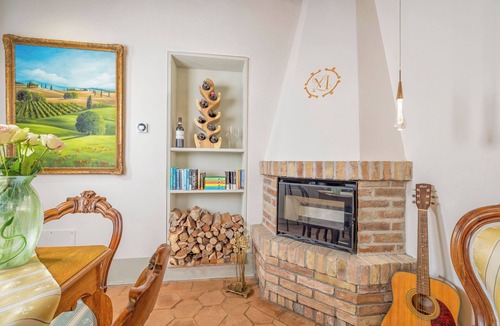 Montalcino Apartment | Elegant Tuscan Apartment with Fireplace and Countryside Views