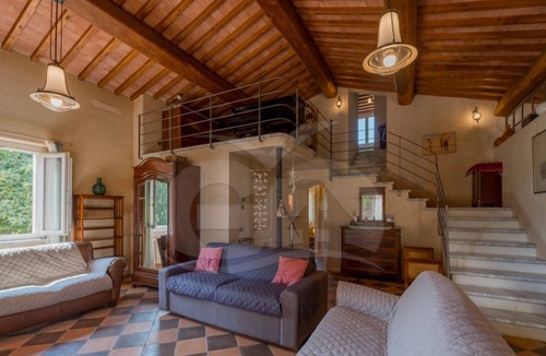 Porto Azzurro Villa | Elegant Villa Ivana 7/8 bed immersed in a green garden 600 meters from Reale beach