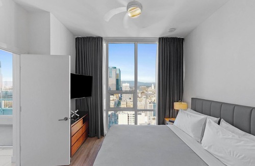 Downtown Los Angeles Apartment | Enjoy city views from our three bedroom suite, private balcony & 2 deluxe baths