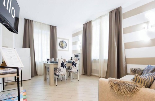 San Teodoro Apartment | Ferry port 1 min| Central 1BR| A/C| WiFi| By Tilo