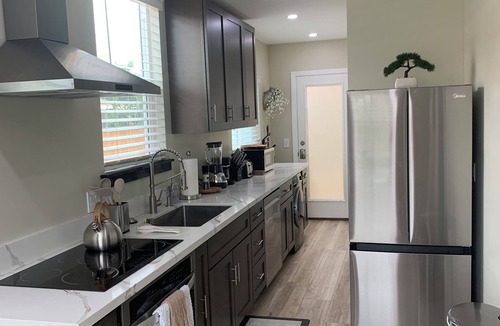 Hawthorne House | Front House South Bay Green Oasis Getaway