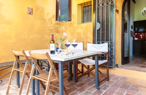Castagneto Carducci Apartment | Garden Apartment with Sea view - hilltop Medieval village, 10' from the Beach.