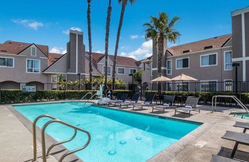 Downtown Village House | Get Ready for the Perfect Vacation Escape! THREE 2BR Suite w/ Full Kitchen, Pool