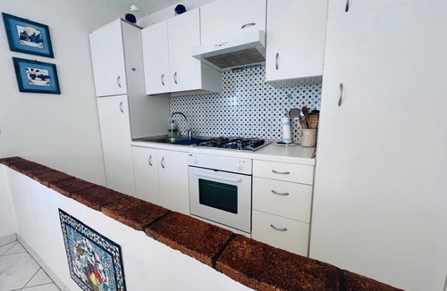 Magazzini Apartment | Giglio d'Oro One-Bedroom Apartment near Magazzini Beach