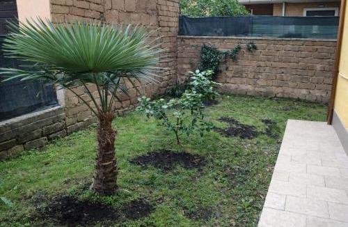 Torre Angela House | Golden Stay Rome - Golden Room with Private Kitchen and Garden - Close to Metro C