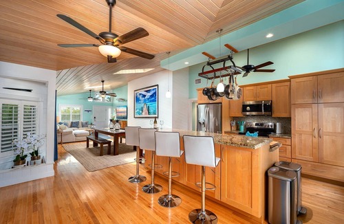 Sugarloaf Shores House | Green Turtle Oasis: Lovely 4BR Canal Front Home, Pool, Dockage, Tiki, Outdoor Dining & Pet Friendly!