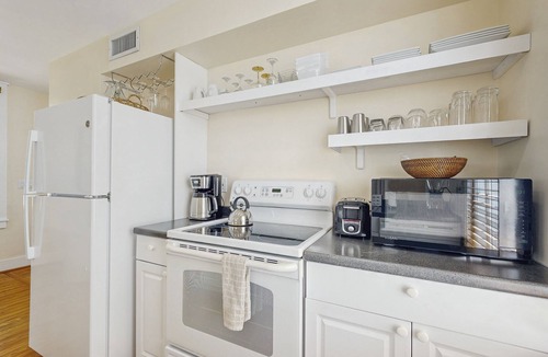Uptown - Upper Duval Condo | Ground-level getaway with free WiFi, private deck, & shared outdoor pool