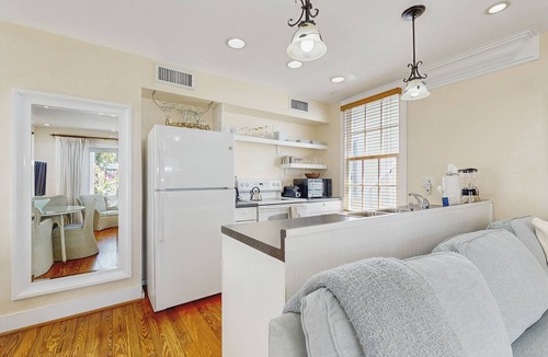 Uptown - Upper Duval Condo | Ground-level getaway with free WiFi, private deck, & shared outdoor pool