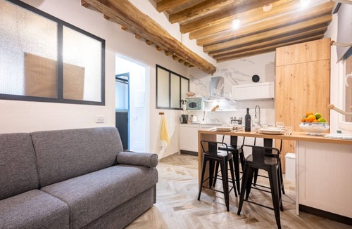 Oltretorrente Apartment | GuestHost - A refined and modern 55 sq m apartment, accommodating up to 4 people, located on the second floor of a 4-story building with an elevator.The property is located in Parma's Oltretorrente neighborhood, a quiet residential area with plenty of am
