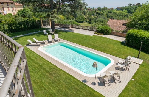 Vignale Monferrato Apartment | GuestHost - Elegant and spacious villa perfect for accommodating up to 12 guests is located in the center of Vignale in the heart of Monferrato area, nominated a UNESCO World Heritage Site in 2014. The house is equipped with every comfort: WiFi, air cond