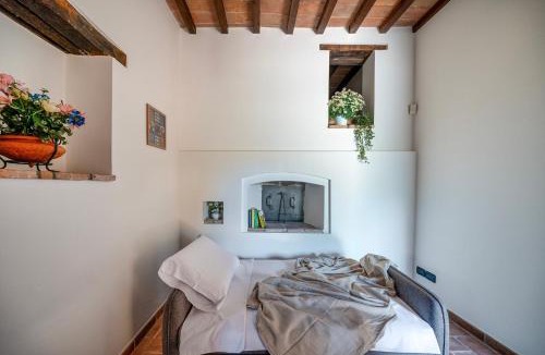 San Martino in Campo Apartment | GuestHost - Il Casale dei Gelsi - 7 Apartments with Pool & Garden