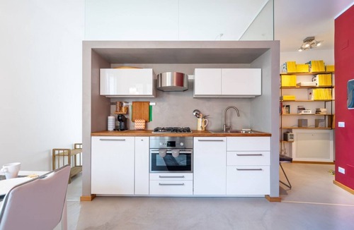 Oltretorrente Apartment | GuestHost - Modern 60 sqm apartment located on the fourth floor of a renovated 30's building without a lift (stairs to access it).The apartment consists of a living room with kitchenette, bedroom and bathroom. The bedroom is inspired by La Chayhana in Uz