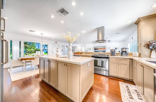 Garden Isles House | Heated Pool! WaterFront Home! 1 Mile To Beach!