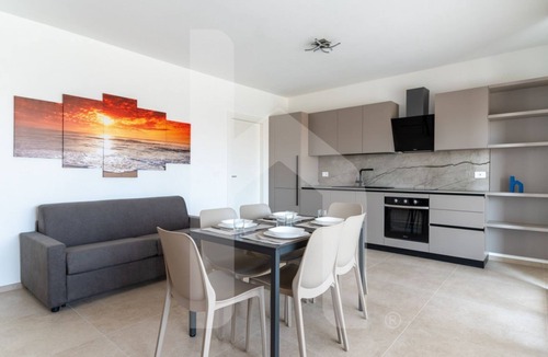 Foggetta Apartment | Holiday home ELEA is the 2025 novelty that will give you a holiday in Pineto but with the charm of a new modern construction, fresh and designed with all the comforts. The Calipso apartment has a large living room with kitchenette and sofa bed at the ent