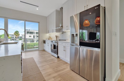 Pirates Cove House | Keys Casa: Elegant Waterfront Retreat, Sleeps 16, Elevator, Private Dock, Putt-Putt
