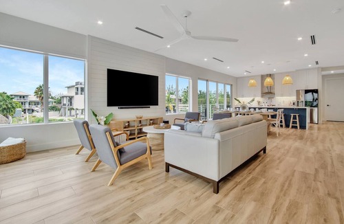 Pirates Cove House | Keys Casa: Elegant Waterfront Retreat, Sleeps 16, Elevator, Private Dock, Putt-Putt