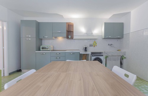 Magazzini Apartment | Located on the ground floor, it consists of a living room with kitchenette and sofa bed, a double be