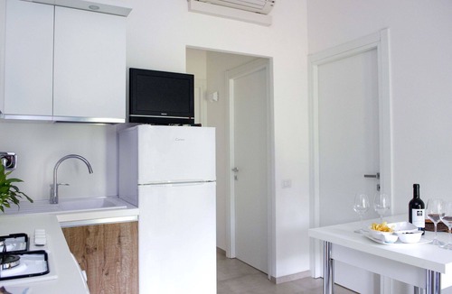 Le Rocchette House | Lovely apartment in villa for 5 people with WIFI, pool, A/C, TV and patio