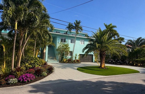 Marathon House | Luxury Duck Key Waterfront Estate-Heated-Chilled-Pool-Spa Boat Lifts Golf Cart