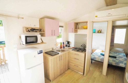 Gralaoni-Pralesi-Cisano House | Mobilehome with air conditioning, terrace and pool