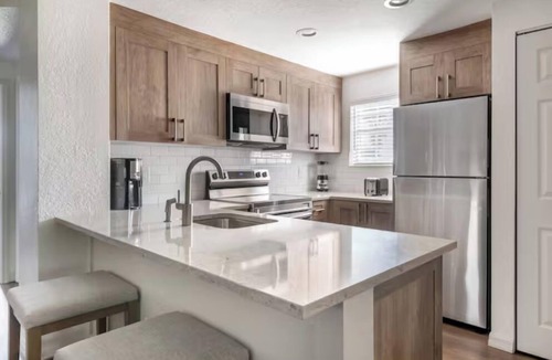 West Kissimmee Hotel | More Than a Stay—A Better Way to Travel! 2 Units with Kitchen, Outdoor Pool!