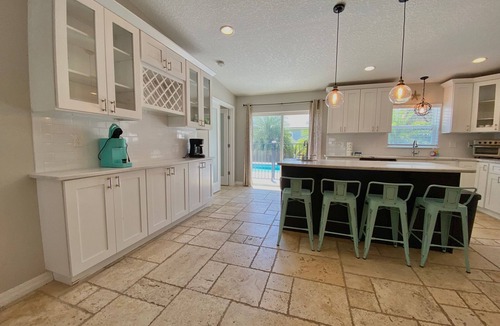 Butler Beach House | Mystical - Relaxing Heated Pool and Stylish Comfortable Home, Pet Friendly!