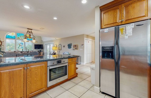 Cutthroat Harbor Estates House | Ocean-view snowbird retreat with private pool, rooftop, lanais, kayak & bikes