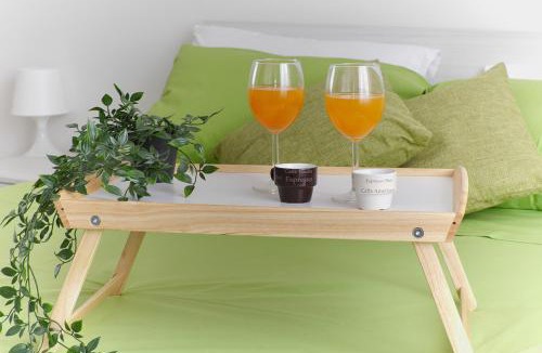 Cornaredo Apartment | Orange Apartment by Rhospitality