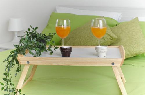 Cornaredo Apartment | Orange Apartment by Rhospitality