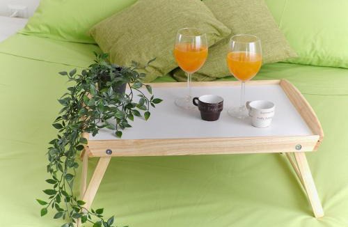 Cornaredo Apartment | Orange Apartment by Rhospitality