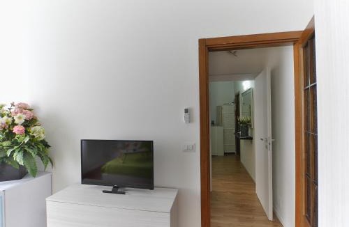 Cornaredo Apartment | Orange Apartment by Rhospitality