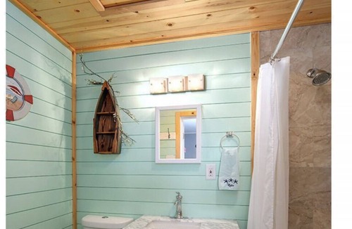 Port Pine Heights House | PADGETT PARADISE with Two Boat Slips with Filet Table. POOL