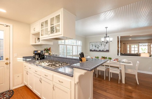 La Palma Apartment | Private 4-bedroom pool home with 2 primary suites with heated pool, jacuzzi, fire pit, and outdoor dining. Minutes to Disneyland, Knott’s, and Orange County beaches.