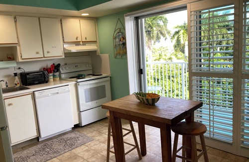 Layton House | Private Family Friendly Beachfront Paradise. 2 Bedroom/2 Bath End Unit w/Views.