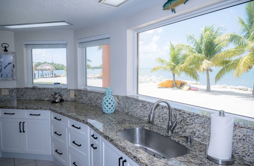 Layton House | Private Waterfront Home, Heated Pool, Beach, Tiki w/Grill, Dock, Kayaks, Sunset