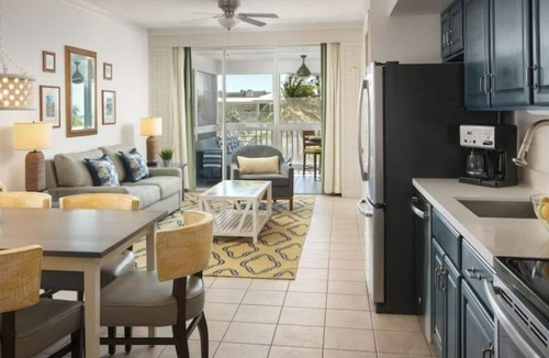 Key West Resort | Relax by the zero-entry pool or on-site beach. Resort amenities