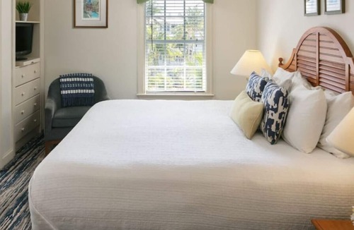 Key West Resort | Relax by the zero-entry pool or on-site beach. Resort amenities