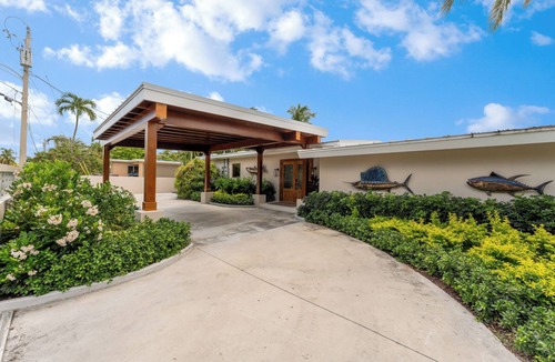 New Town House | RISE AND SHINE ~ Canal Front 3 BR/3Ba Home w/Heated Pool!