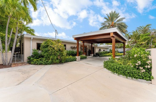 New Town House | RISE AND SHINE ~ Canal Front 3 BR/3Ba Home w/Heated Pool!