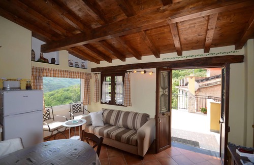 Costiolo Apartment | Romantic apartment with large terrace in panoramic position in the green