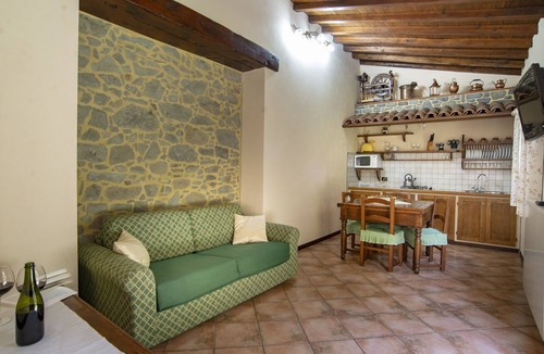 Pieve Fosciana Cottage | Romantic Farm Apartment with Infinity Pool & Mountain Views in Garfagnana