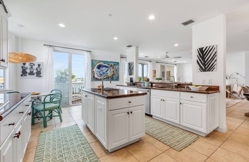 Meadows House | SEVENTH HEAVEN~Waterfront 5 BR, 4 Ba Townhome with Pool, Elevator & Dockage!