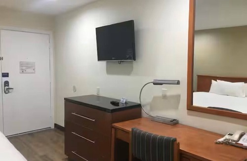 Arlington Hotel | Simply Home Suites - Cozy Comfort, Feels Like Home