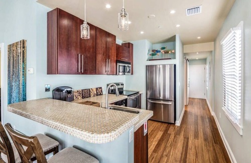 Downtown Apartment | Sky Suites Retreat - Balcony Overlooking Duval