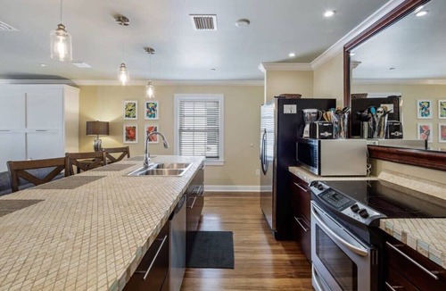 Downtown Apartment | Sky Suites Retreat - Balcony Overlooking Duval