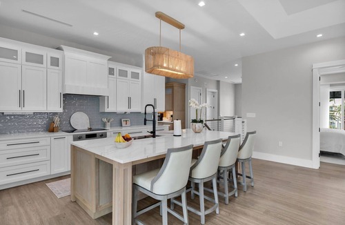 Coury House | Sophisticated 5-bedroom, elevator, 50' dock, heated pool/spa, kayaks, sleep 12