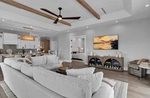 Coury House | Sophisticated 5-bedroom, elevator, 50' dock, heated pool/spa, kayaks, sleep 12