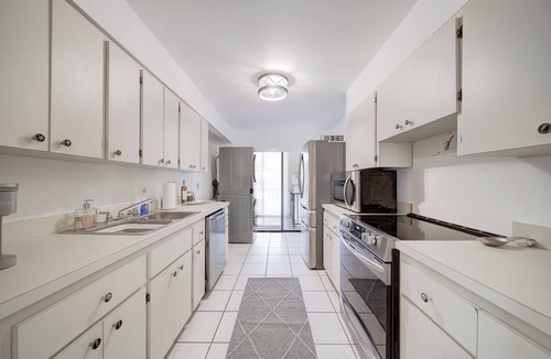 Rock Harbor Villa | Spacious 4-bedroom Key Largo Villa steps from the pool, pickleball, & marina.