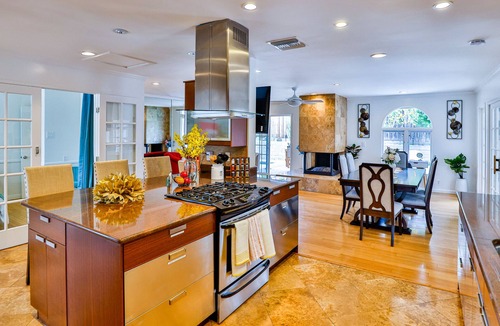 Orange House | Spacious vacation home with fireplace, yard and pool